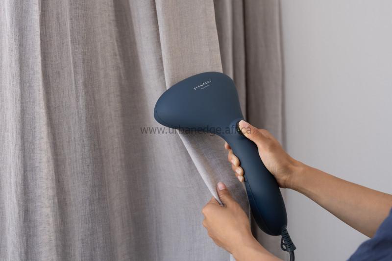 Maintaining pinch pleat curtains — gentle vacuum cleaning